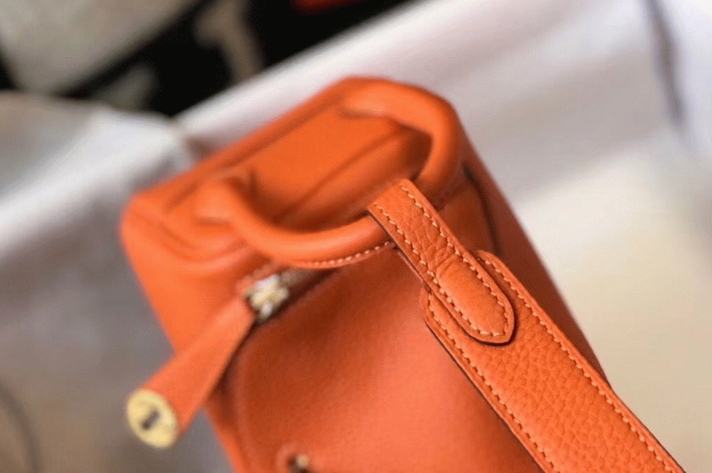 Replica Hermes Lindy Mini handbag in orange color angle 5