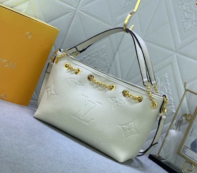 Louis Vuitton Monogram Empreinte Leather Bundle Bag In Cream angle 5