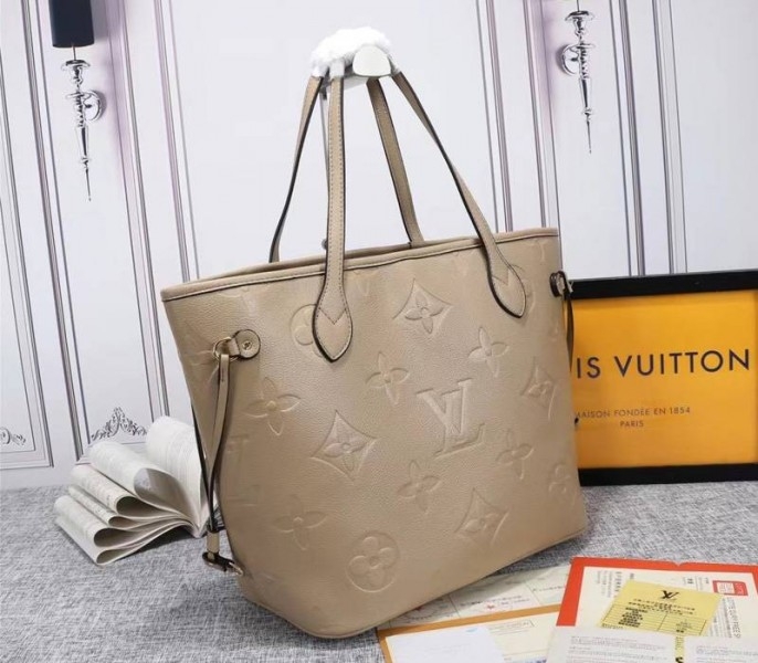 Louis Vuitton Monogram Empreinte Neverfull MM Tote In Beige angle 2