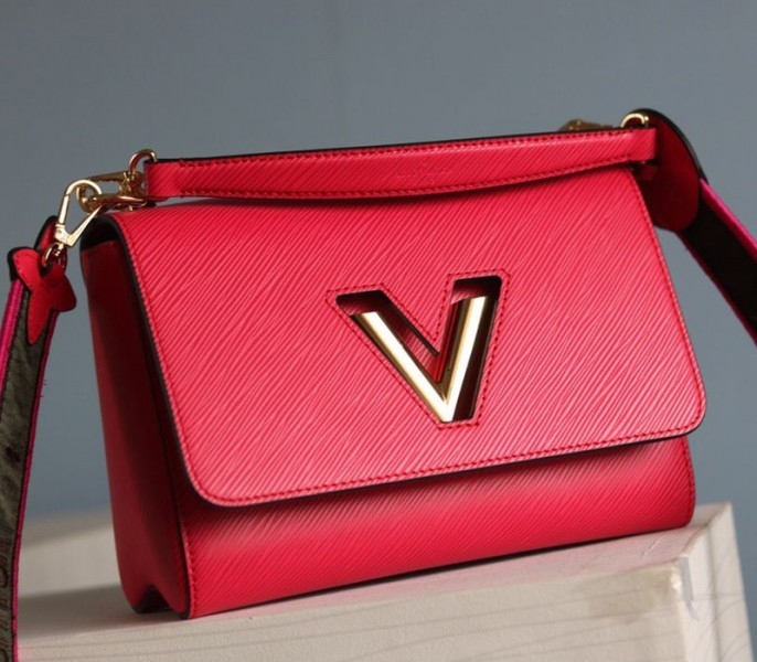 Louis Vuitton Epi Leather Twist MM Handbag In Red With Embroidered Strap angle 4
