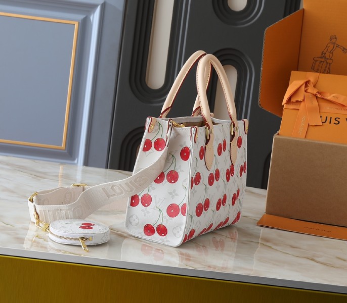 LV X TM Monogram Cherry Canvas Onthego PM In White angle 2