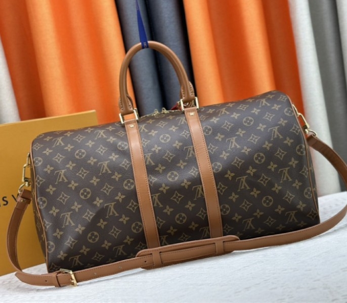 Louis Vuitton Monogram Dust Canvas Keepall Bandouliere 50 In Brown angle 3