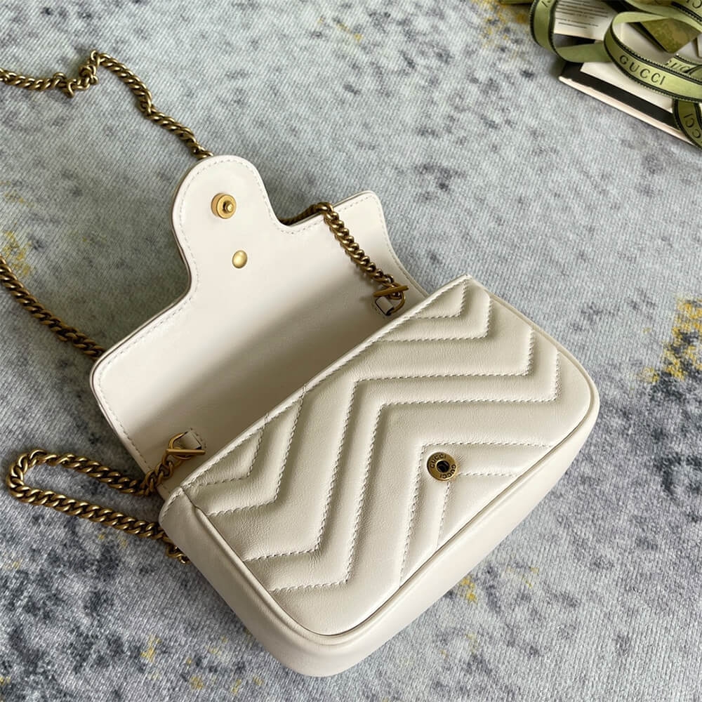 GG Marmont matelasse leather super mini bag angle 5