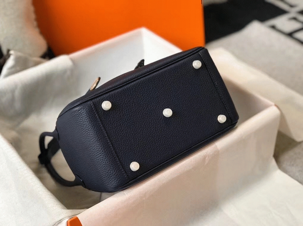 Fake designer Hermes Lindy 26cm handbag in navy blue angle 2