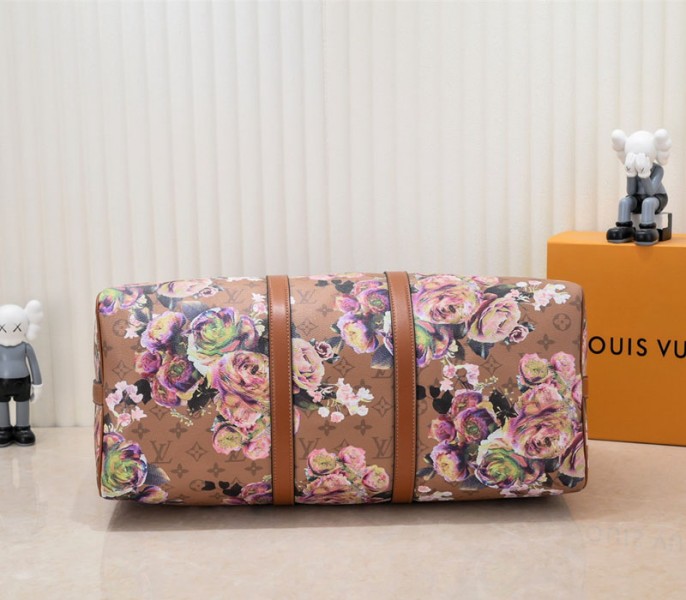 Louis Vuitton Keepall Bandouliere 50 Travel Bag In Brown With Floral Pattern angle 3