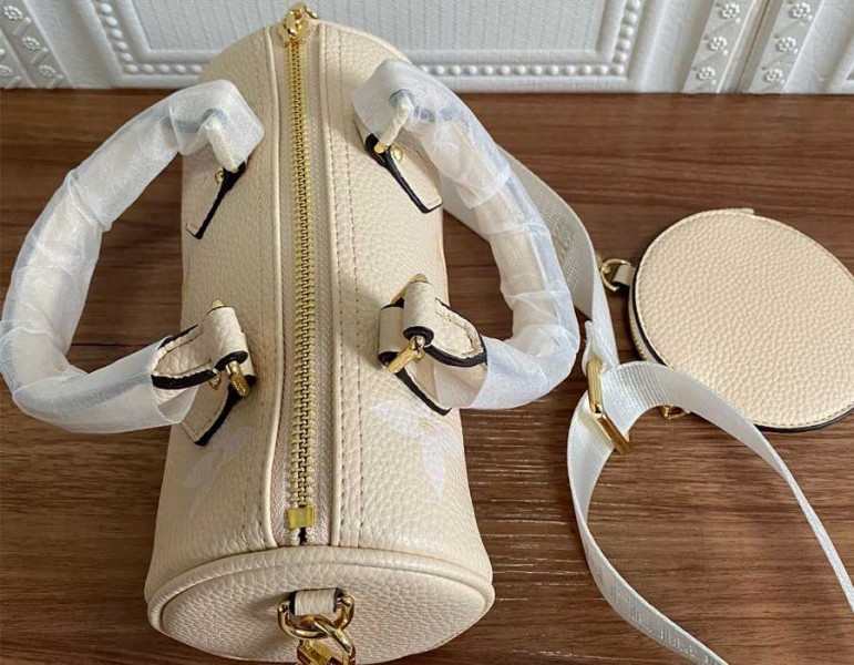 Louis Vuitton Bicolor Monogram Empreinte Papillon BB Bag In Cream And Saffron angle 3