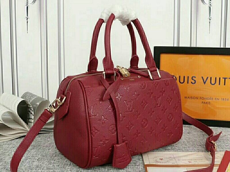 Louis Vuitton Monogram Empreinte Speedy Bandouliere 25 Handbag In Bordeaux angle 2