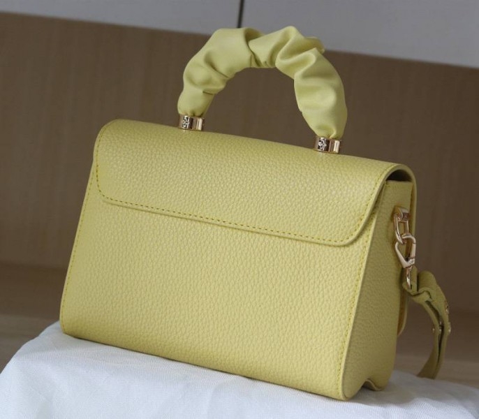 Louis Vuitton Taurillon Leather Twist MM Scrunchie Handle In Ginger Yellow angle 3