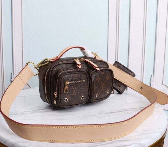Louis Vuitton Monogram Canvas Utility Bag angle 2