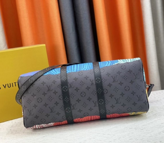 Louis Vuitton X YK Monogram Eclipse Reverse Keepall 45 Luggage In Pumpkin angle 3