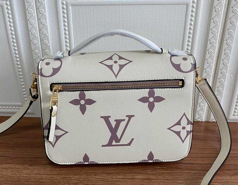 Louis Vuitton Bicolor Monogram Empreinte Metis Bag In Cream And Bois De Rose Pink angle 4