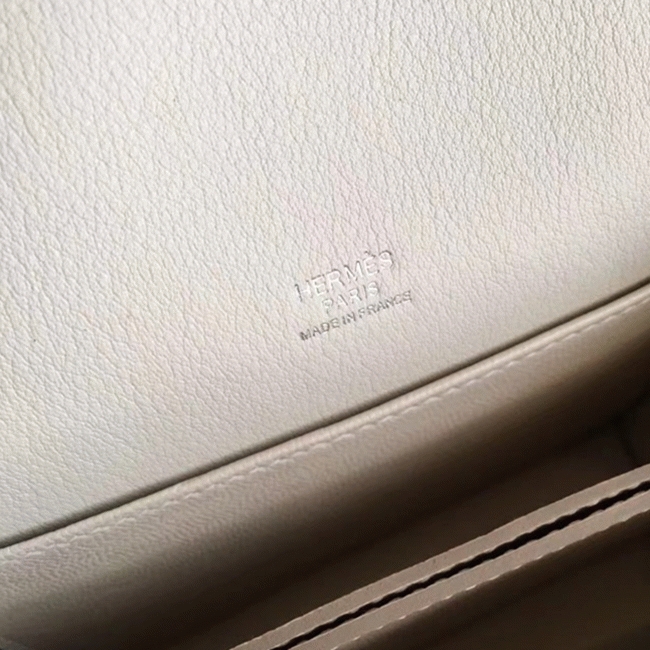 Ivory cheap replica Hermes Mini Sac Roulis handbag angle 4