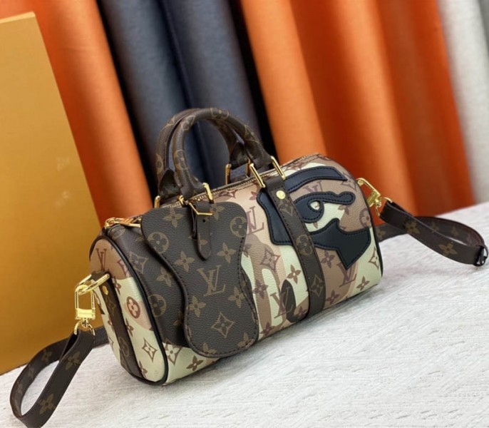 Louis Vuitton J Hope X Keepall Bandouliere 25 Brown Travel Bag In Two Eyes Patches angle 2