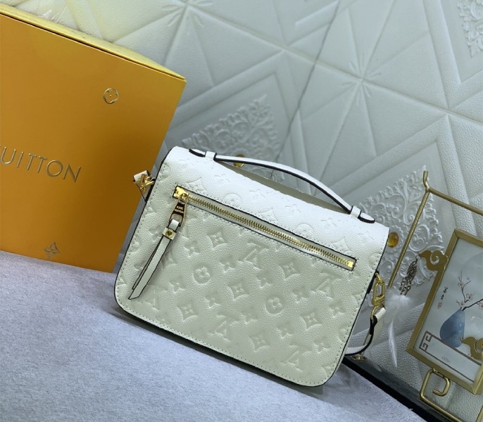LV Monogram Empreinte Leather Metis In Cream M46552 angle 3