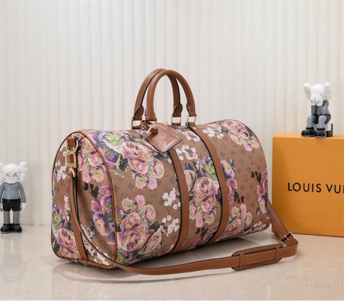 Louis Vuitton Keepall Bandouliere 50 Travel Bag In Brown With Floral Pattern angle 2