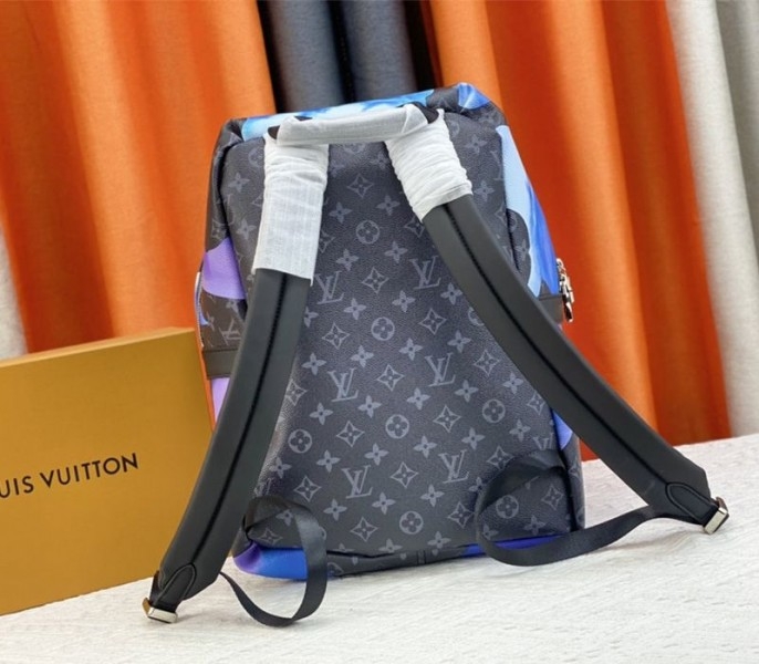 Louis Vuitton Monogram Eclipse Discovery Backpack In Blue Sunrise angle 4