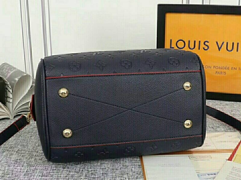 Louis Vuitton Monogram Empreinte Speedy Bandouliere 25 Handbag In Navy Blue angle 4