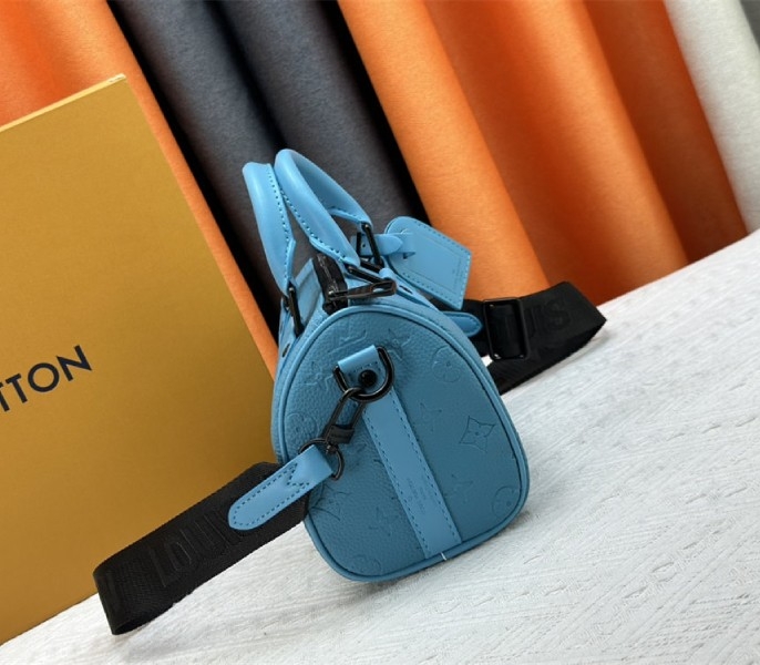 Louis Vuitton Taurillon Monogram Leather Keepall Bandouliere 25 In Turquoise angle 4