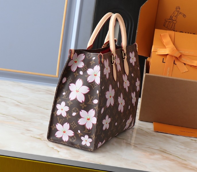 LV X TM Monogram Canvas Onthego MM With Cherry Blossom angle 5