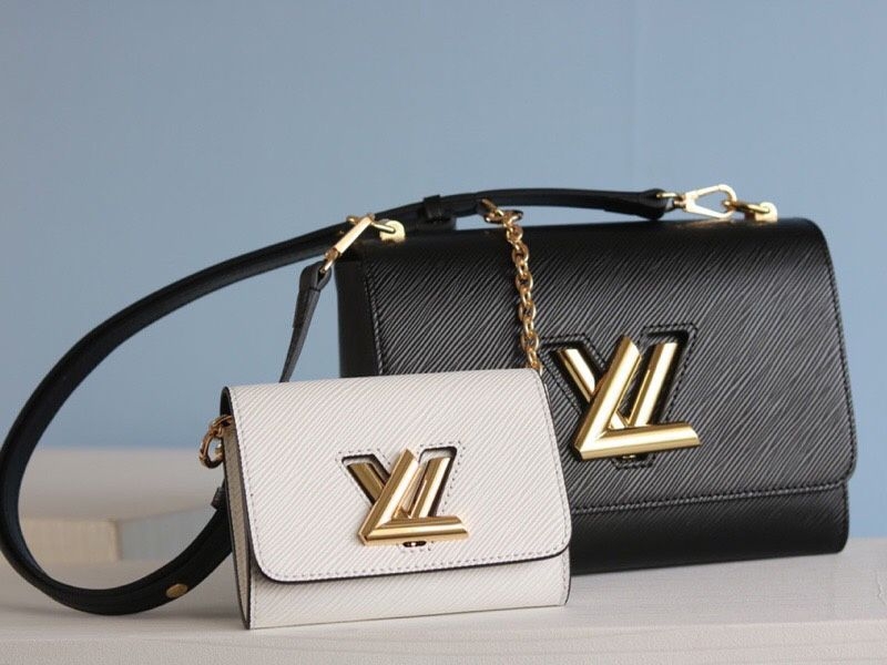 Louis Vuitton Epi Leather Twist MM And Twisty Bag In Black And White angle 3