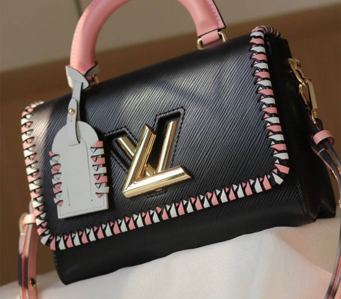 Louis Vuitton Epi Leather Twist MM Bag In Black With Braided Edges Flap angle 2