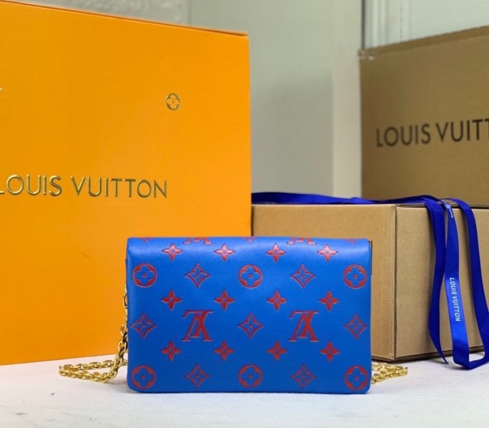 Louis Vuitton Coussin Pochette In Blue And Red angle 4