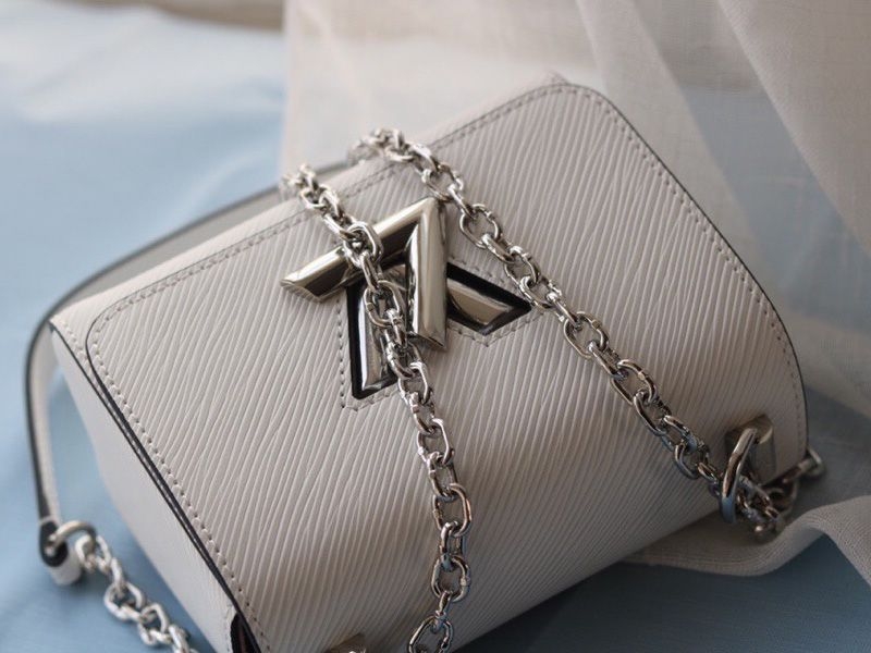 Louis Vuitton Epi Leather Twist Mini Bag In Off-White angle 2