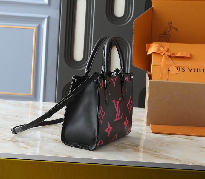 Monogram Empreinte OnTheGo PM Tote In Black And Magenta Pink angle 2