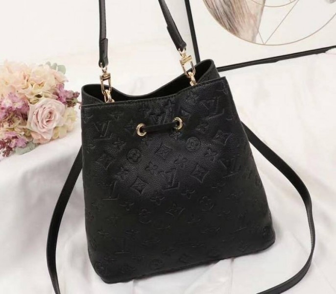 Louis Vuitton Monogram Empreinte NeoNoe MM Bag In Black angle 3