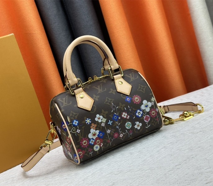 Louis Vuitton X TM Monogram Canvas Speedy Bandouliere 20 angle 2