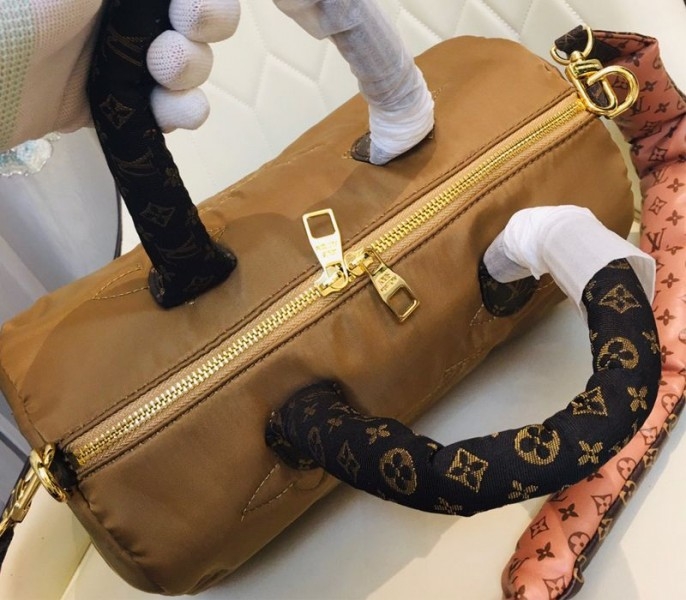 Louis Vuitton Econyl Regenerated Nylon Speedy Bandouliere 30 Handbag In Beige angle 5