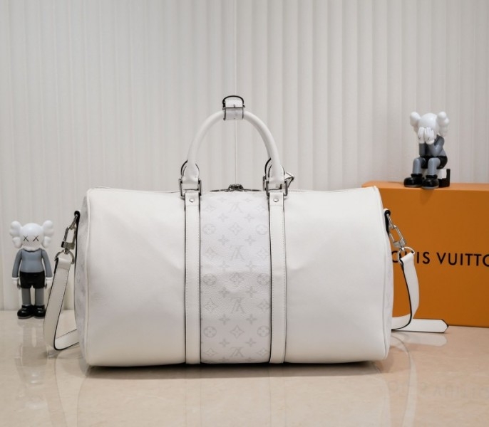 Louis Vuitton Taiga Leather Keepall Bandouliere 50 Travel Bag In White angle 3