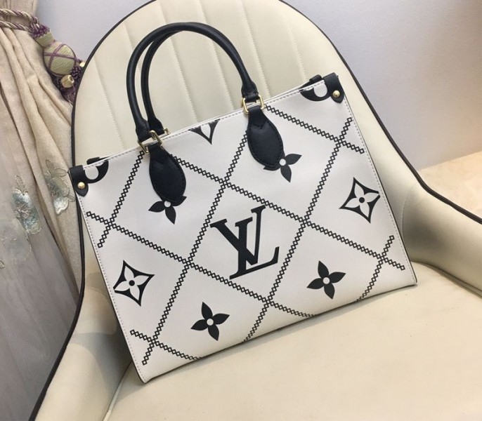 Louis Vuitton Spring 2022 Monogram Empreinte Onthego MM Tote In Cream