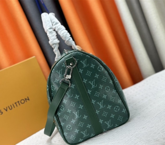 Louis Vuitton Monogram Heritage Canvas Keepall Bandouliere 50 In Green angle 4