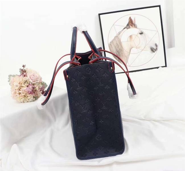 Louis Vuitton Monogram Empreinte Giant Onthego GM Tote In Navy Blue angle 4