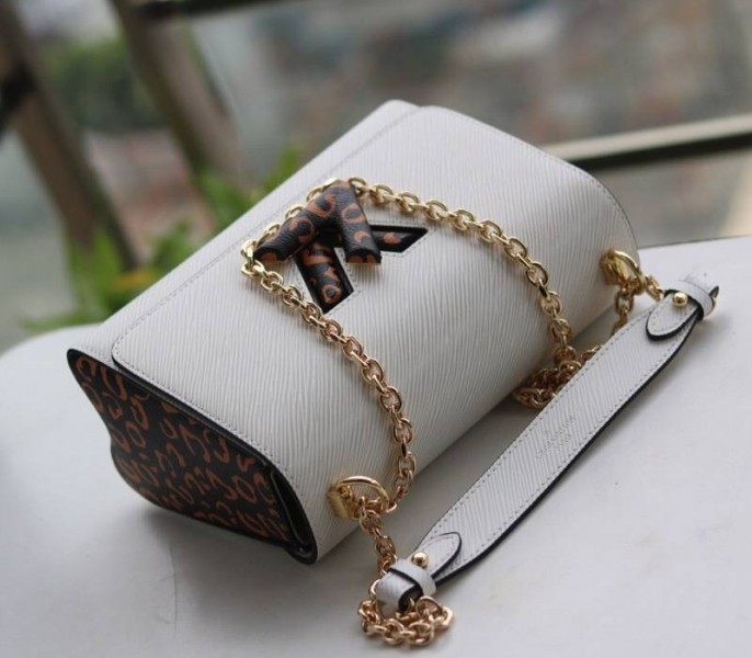 Louis Vuitton Epi Leather Jungle Edition Twist MM Bag In Optic White angle 5