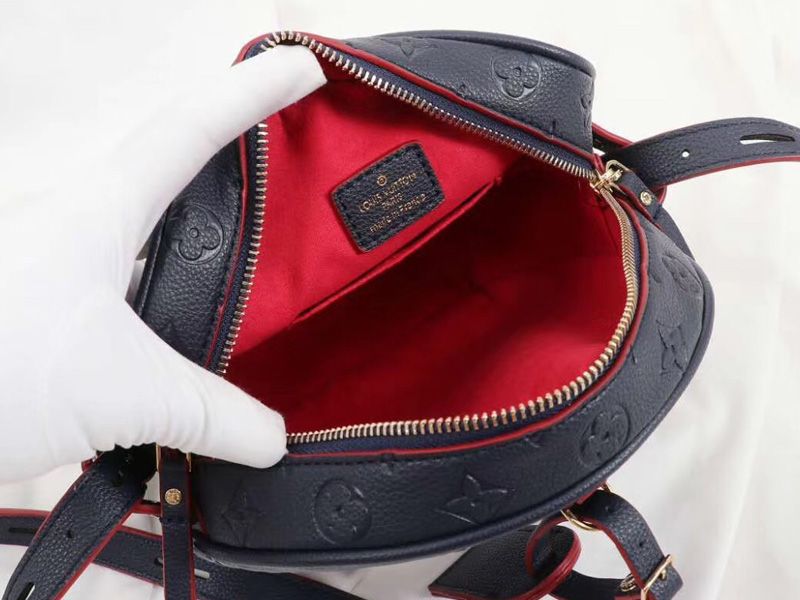 Louis Vuitton Monogram Empreinte Boite Chapeau Souple MM Bag In Navy Blue angle 3
