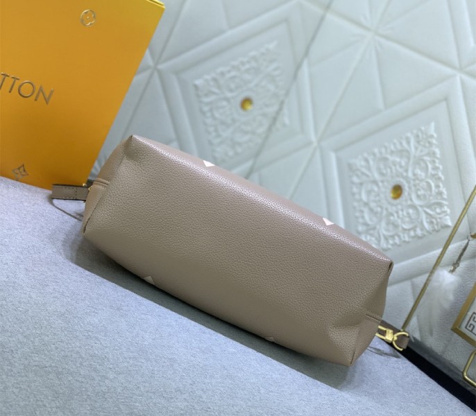 Louis Vuitton Bicolor Monogram Empreinte Bundle Bag In Tourterelle Gray and Cream angle 3