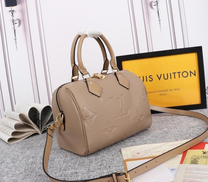 Louis Vuitton Monogram Empreinte Leather Speedy Bandouliere 25 Handbag In Tourterelle Gray angle 2