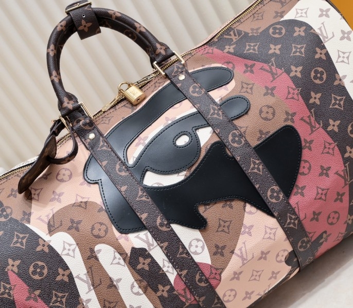 LV J Hope X Keepall 55 Brown In Two Eyes Patches angle 3