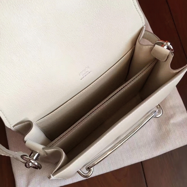 Ivory cheap replica Hermes Mini Sac Roulis handbag angle 2