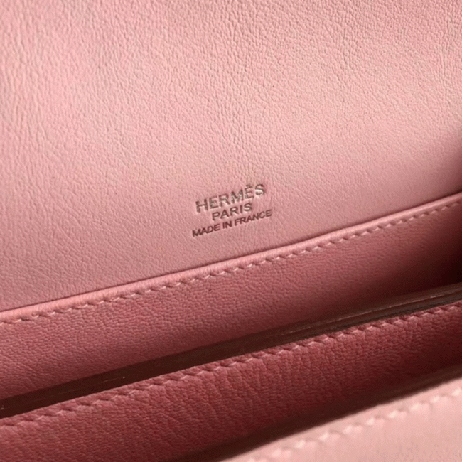 Rose dragee replica Hermes Mini Sac Roulis handbag angle 3