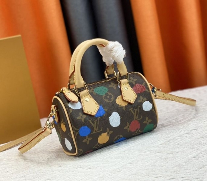 Louis Vuitton X YK Monogram Canvas Speedy Bandouliere 25 Handbag angle 2