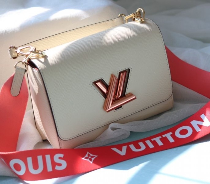 Louis Vuitton Epi Leather Twist MM Handbag In Quartz White With Gradient Strap angle 4
