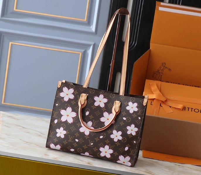 X TM Monogram Canvas Onthego MM With Cherry Blossom angle 2