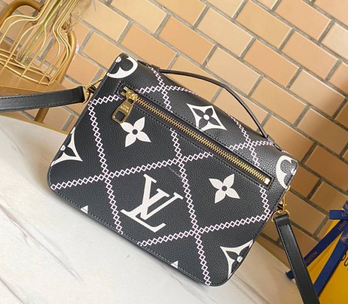 Louis Vuitton Spring 2022 Monogram Empreinte Pochette Metis Handbag In Black angle 2