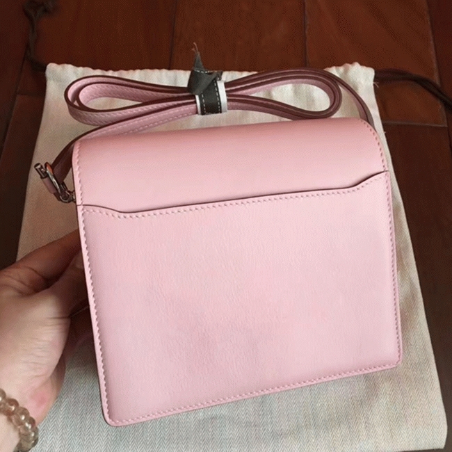 Rose dragee replica Hermes Mini Sac Roulis handbag angle 4
