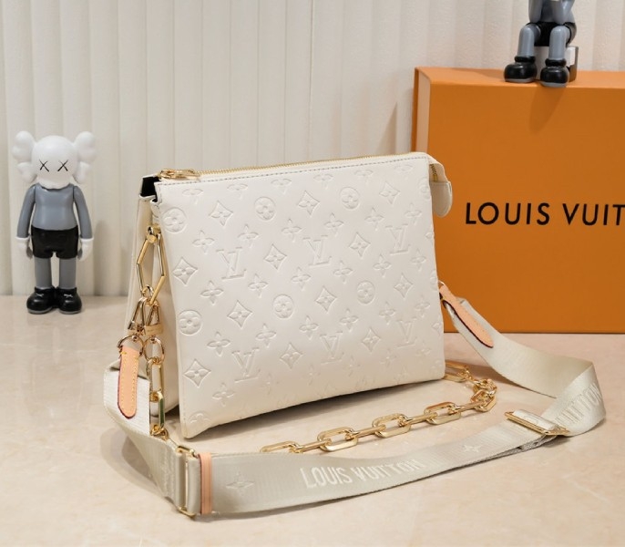 Louis Vuitton Coussin PM Bag In Cream With Jacquard Strap angle 2