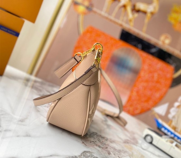 Louis Vuitton Bicolor Monogram Empreinte Leather Bagatelle Mini Hobo In Tourterelle Gray angle 3