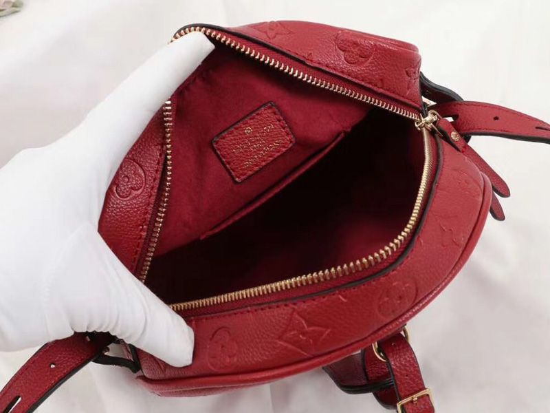Louis Vuitton Monogram Empreinte Boite Chapeau Souple MM Bag In Red angle 3